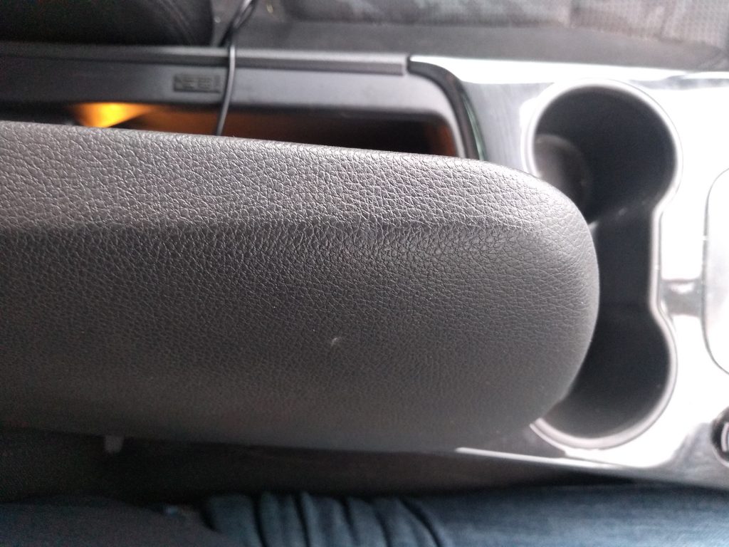 The Peugeot 3008: A bloody awful car 3 The storage bin lid of the Peugeot 3008 opens up towards the driver, meaning it's difficult for the driver to see what's in there.