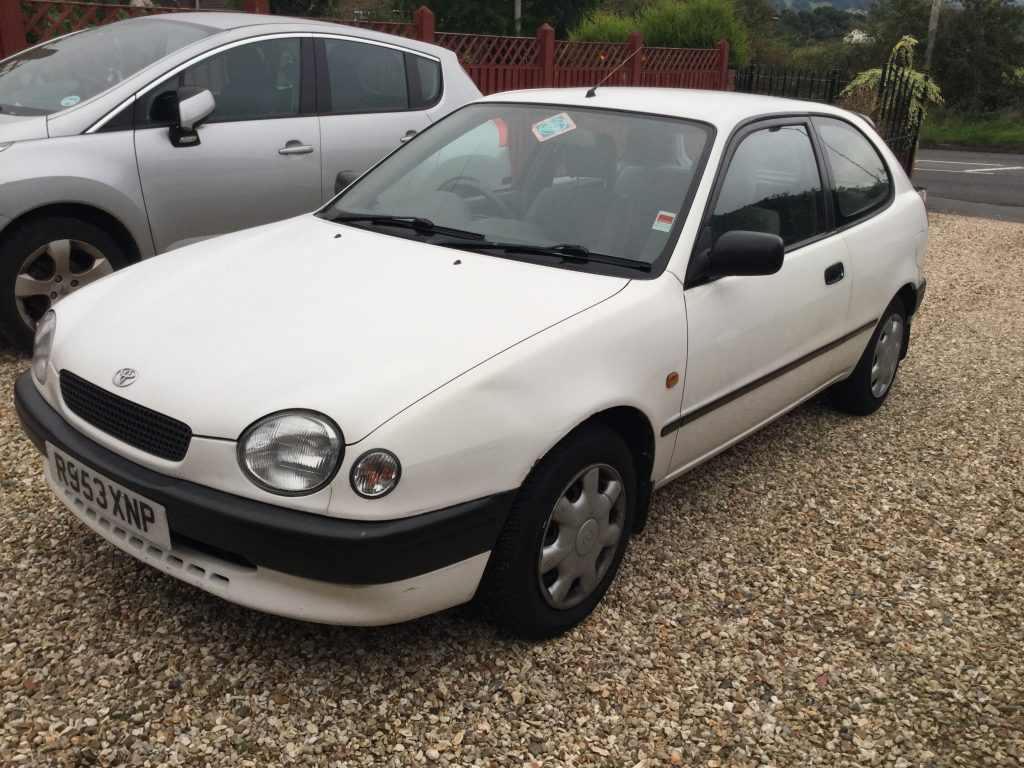 My Toyota Corolla, called Paddy. It's poverty spec with a 1.3 litre engine. 