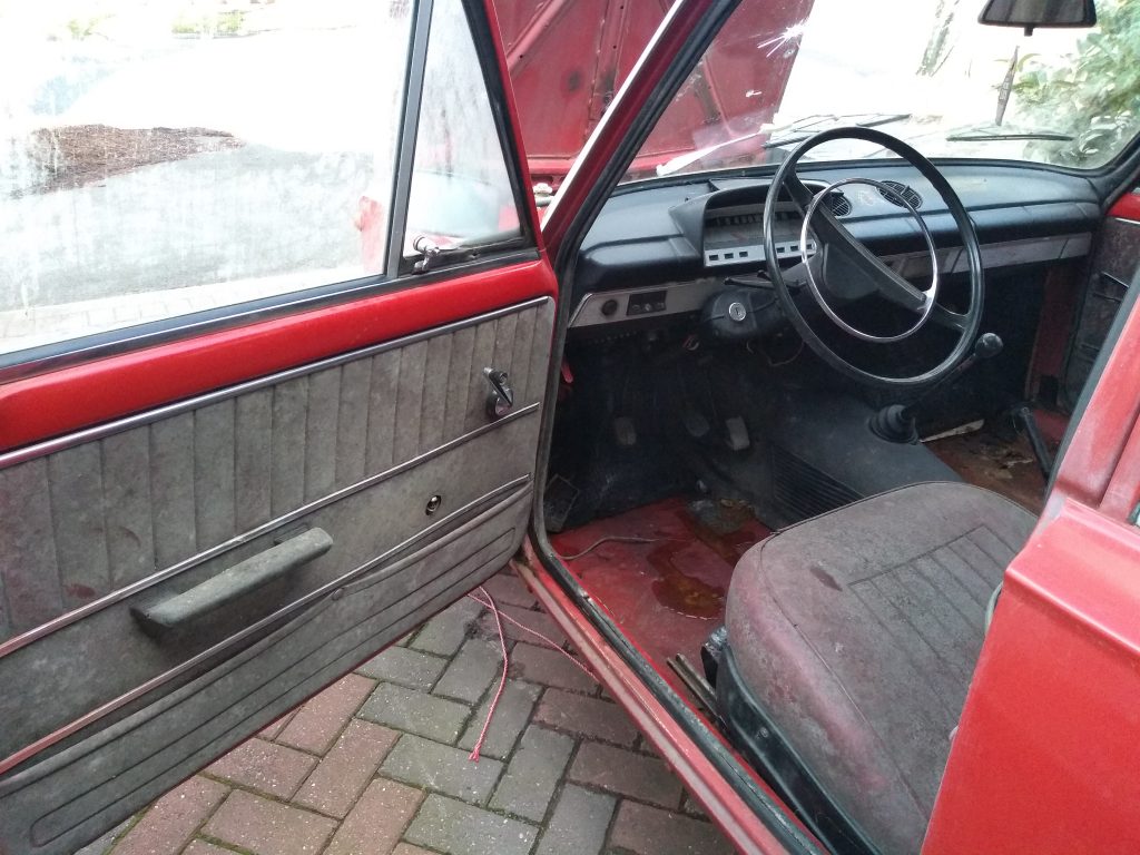 The interior of my Lada 2101 Zhiguli, as you can see the door card is extremely moldy as well as the seats.