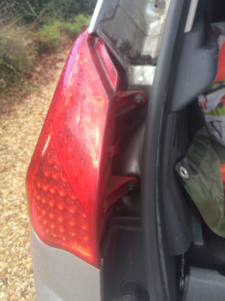 Two 10mm nuts hold the rear light cluster on to the Peugeot 3008.