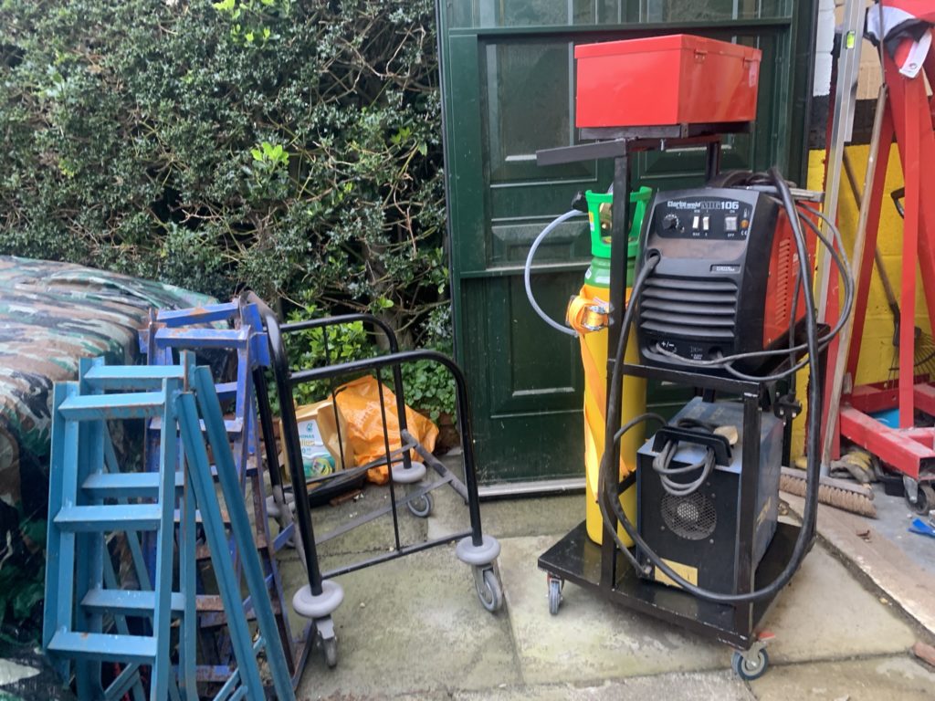 My compact welding cart called "Stiletto", made mostly out of scrap or recycled steel. Designed to meet my own specific needs in a compact space saving packet.